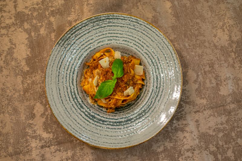 Tagliatelle al Ragù handmade pasta with slow-cooked meat sauce